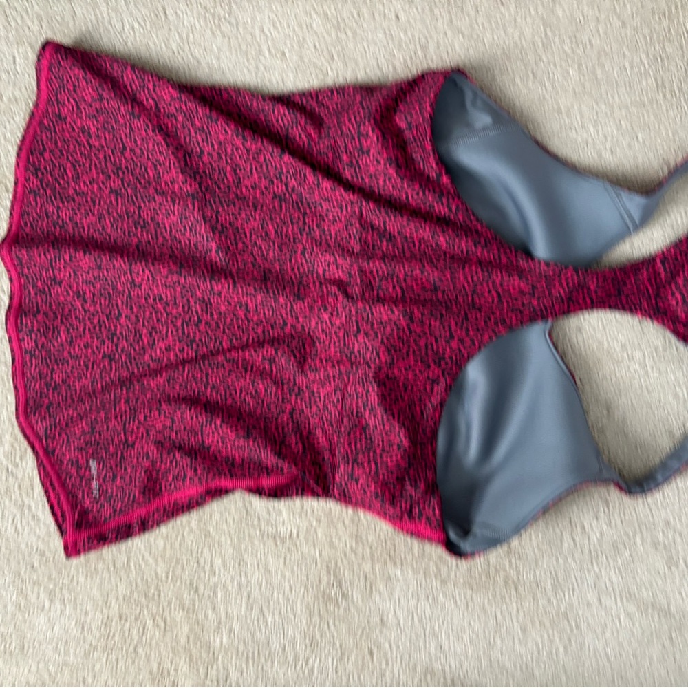 Nike tennis outfit. Racer back top with built in bra. No pads.